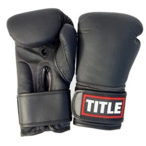 The TITLE Powerhide Sparring Gloves feature durable synthetic leather, multi-layer shock-absorbing foam, and a full wrap-around wrist strap for secure sparring.
